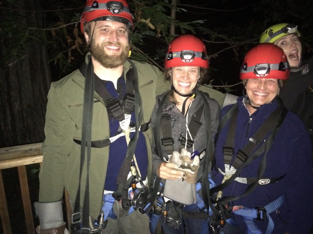 Deborah and Nicole with their guide for nighttime ziplining